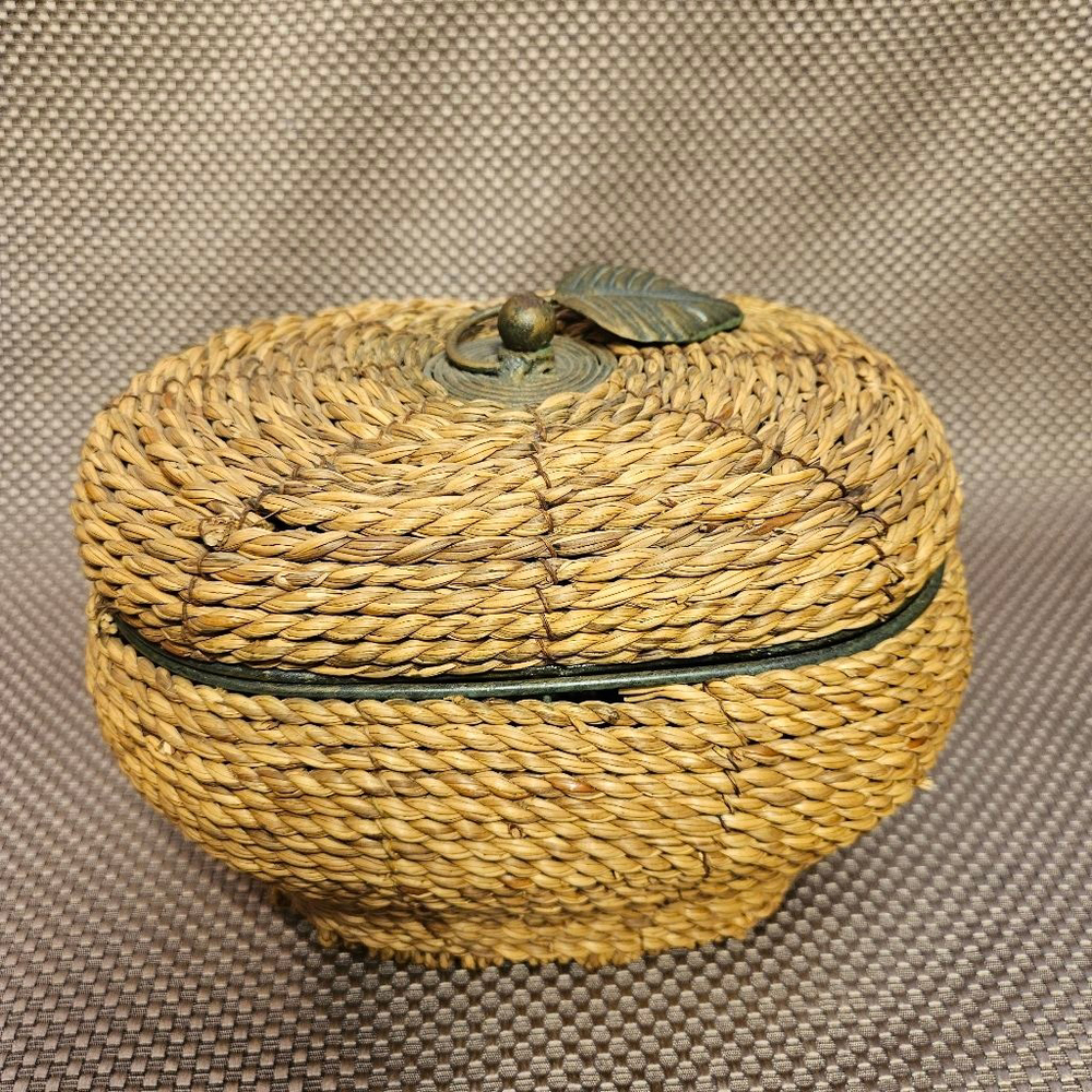 Vintage hand-woven coiled rye straw rattan wicker basket with metal leaf topper